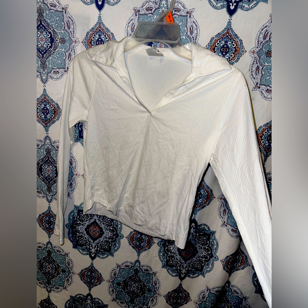 V-neck not buttons, but it is a V-neck longsleeve,